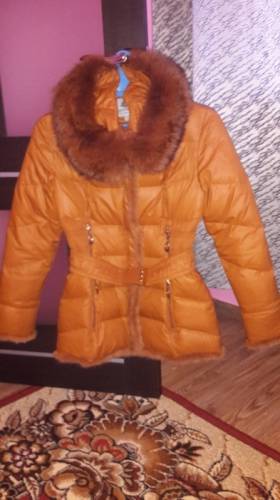 Продам б/у пуховик